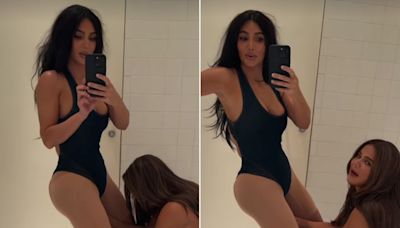 Kim Kardashian Shares Hilarious Video of Sister Khloé Fastening Her Bodysuit in Bathroom: ‘Things I Find in My Phone’