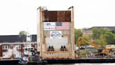 What is 3,700-ton arrival at Portsmouth Naval Shipyard? Part of yard's transformation
