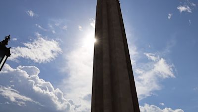 Rebuilding the flame atop the Liberty Memorial