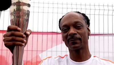 Video: Snoop Dogg carries Olympic torch in relay last leg