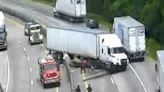 I-24 closed after tractor-trailer crashes through median wall