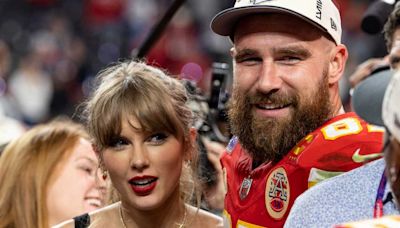 Fans Are ‘In Tears’ As Travis Kelce Carries Taylor Swift In ‘Unhinged’ Surprise Eras Tour Moment