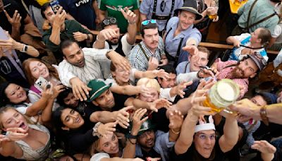 AP PHOTOS: Thousands of beer lovers descend on Munich for Oktoberfest