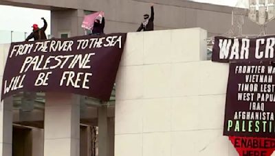 Pro-Palestine protesters climb roof of Australia's Parliament House in Canberra