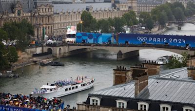 Historic parade on Seine, Lady Gaga and rain mark start of Paris Olympics as Emmanuel Macron declares Games open