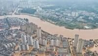 An aerial view of flooded buildings and streets in central China's Hunan province following heavy rains this week