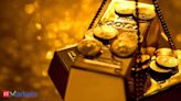Gold prices may face headwinds from strong dollar, rising yields