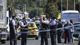 2 children dead and 9 others injured in stabbings in England, police say; 2 adults also wounded