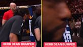 Referee Herb Dean takes unexpected whack to the head while officiating UFC fight