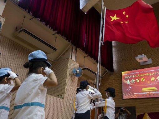 School children sang anthem too softly - Hong Kong