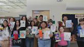 West Warwick high schoolers turn elementary students monster drawings into stuffed animals