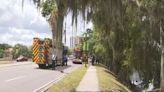 Driver plunges into downtown Orlando lake