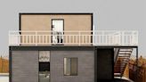 This 2-Story Tiny House Has Skylights, a Balcony, and Even an Optional Elevator