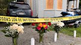 Flowers, candles left in remembrance of 2 killed in fatal Worcester home fire