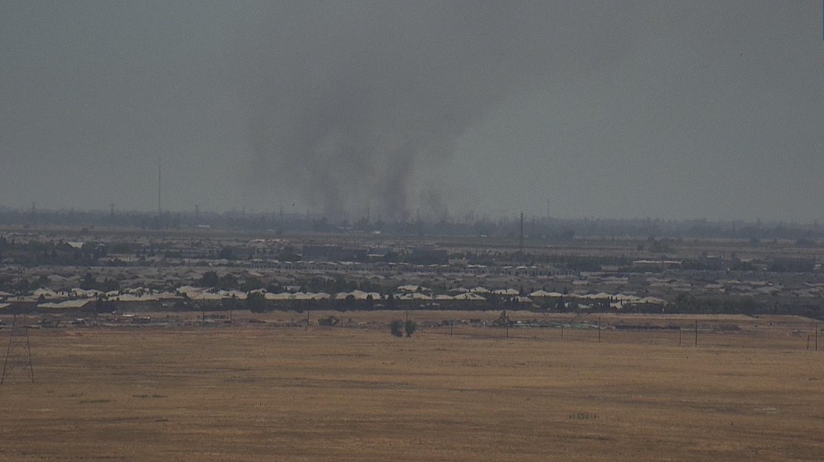 Grass fire in Sacramento County threatens structures in the area