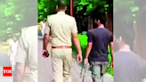 Chain reaction: Cops take man in chains for tour of Taj Mahal, face action | India News - Times of India