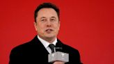 UPDATE 5-Musk sells Tesla stock worth $6.9 bln as possibility of forced Twitter deal rises