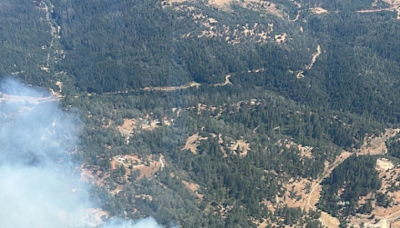 Residential fire spreads into nearby vegetation in El Dorado County, Cal Fire says