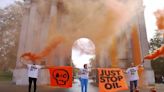 Three arrests after Just Stop Oil protesters spray orange paint on London's Wellington Arch