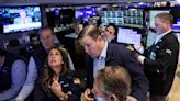 Stocks and bonds wobble as global economy throws off mixed signals