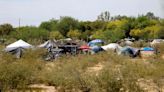 Portion of Tucson's biggest homeless camp gets clear-out notice