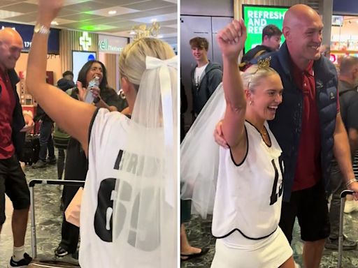 Tyson Fury sways his hips and pretends to strip for hen party