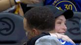 Lindsay Lohan Greets Steph Curry with a Hug as They Chat at Golden State Warriors Game