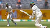 Australia cricketer Khawaja wears a black armband after a ban on his 'all lives are equal' shoes