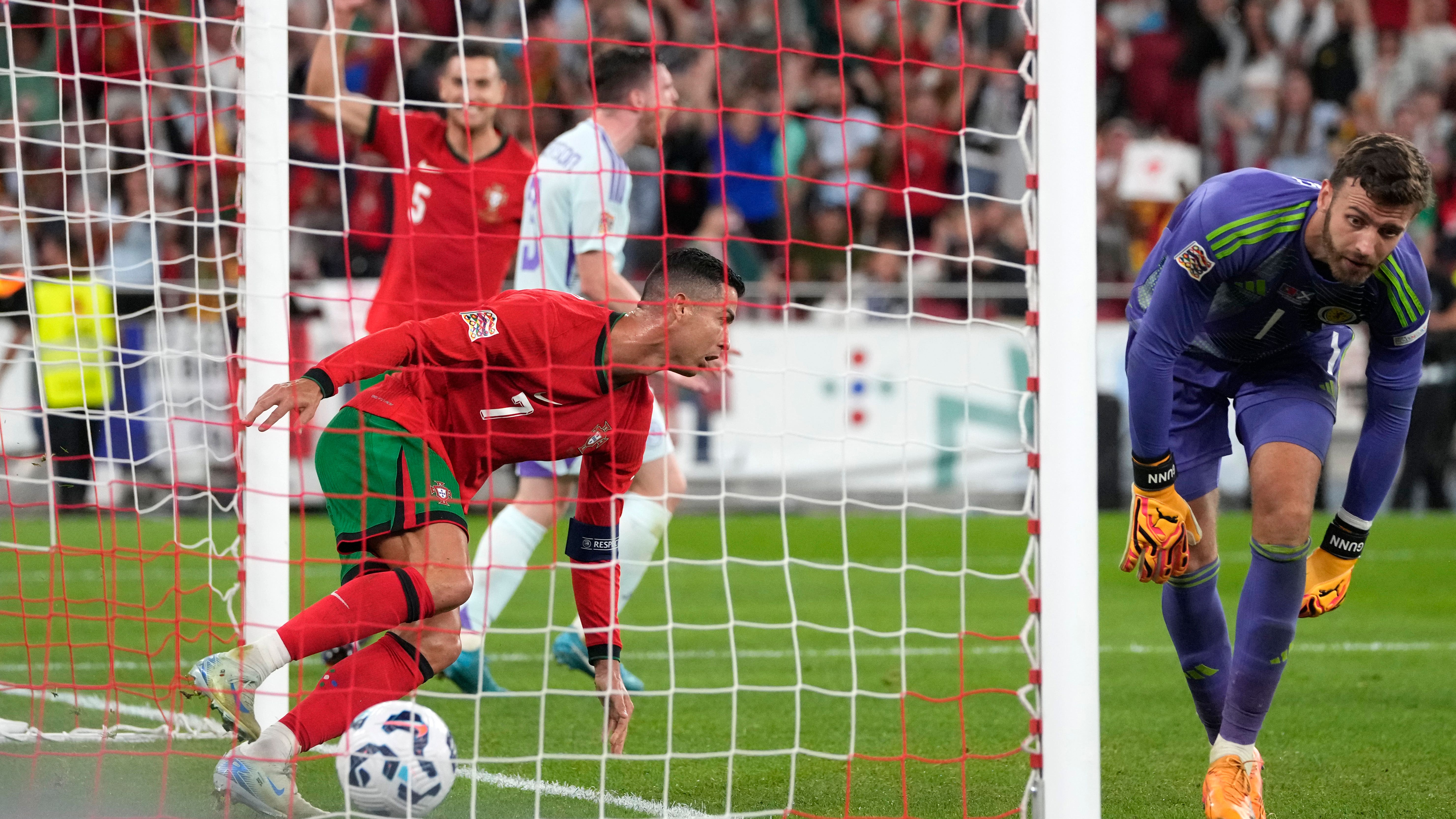 Cristiano Ronaldo’s late winner breaks Scotland resistance in Lisbon