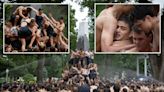 US Naval Academy cadets scale the greased-up Herndon Monument in traditional climb: photos