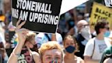 Pride parades march on with new urgency across US