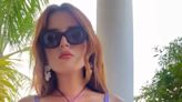 Bella Thorne Celebrates Her 26th Birthday in a Purple Bikini on Tropical Getaway