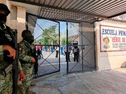 Guardia Nacional vigila escuela amenazada por cobro de piso