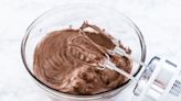 Add This Ingredient To Store-Bought Chocolate Frosting For Amped-Up Flavor