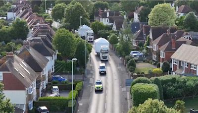 Watch: Police escort wide load blocking main road