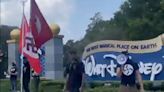 Protesters fly Nazi and DeSantis 2024 flags outside Disney World entrance