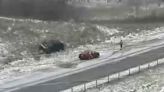 Minnesota Drivers Slip And Slide During Spring Snowstorm