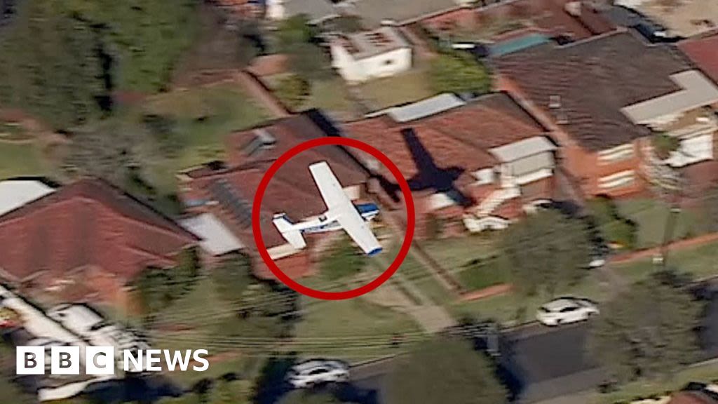 Light plane glides near homes before crash landing in Australia