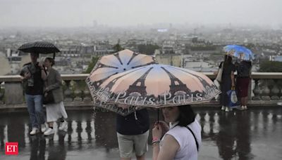 Pouring rain disrupts Olympic Games after drenched opening ceremony