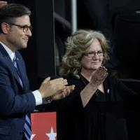 J.D. Vance's mother stands with Speaker of the House Mike Johnson at the Republican National Convention on July 17, 2024