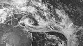 Tropical low off northeast Australia reaches cyclone strength