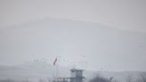 North Korean soldiers cross border, South Korea fires warning shots