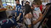 Famílias homenageiam vítimas de atentado em infantário na Tailândia