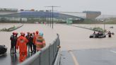 Large-scale rescue operation recovers 7 bodies after flooding traps cars in South Korea tunnel