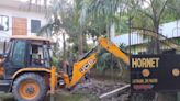 Jalpaiguri district administration continues demolition drive of illegal portions of resorts