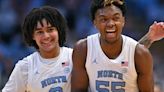 North Carolina's Elliot Cadeau and Harrison Ingram celebrate during the second half against Virginia Tech at the Dean E. Smith Center...