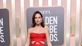 Lily James Stunned on the 2023 Golden Globes Carpet in a Voluminous Red Cut-Out Gown