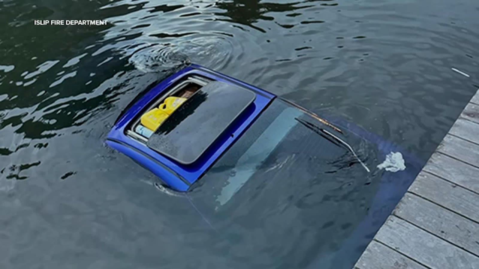 Car submerges in water at Islip Marina