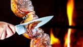 The Traditional Dining Style You'll Find At A Brazilian Steakhouse
