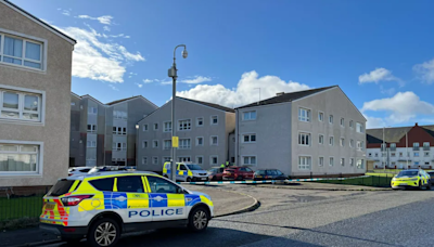 Man charged over death and attempted murder at flat